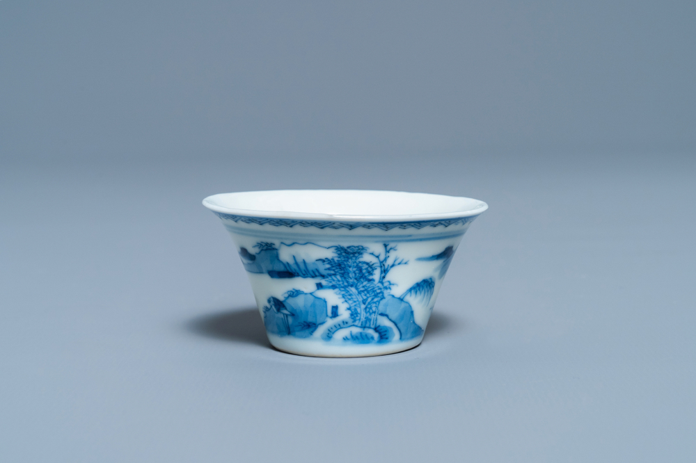 A Chinese blue and white inscribed wine cup, Kangxi